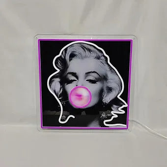 Blonde Blowing Bubble